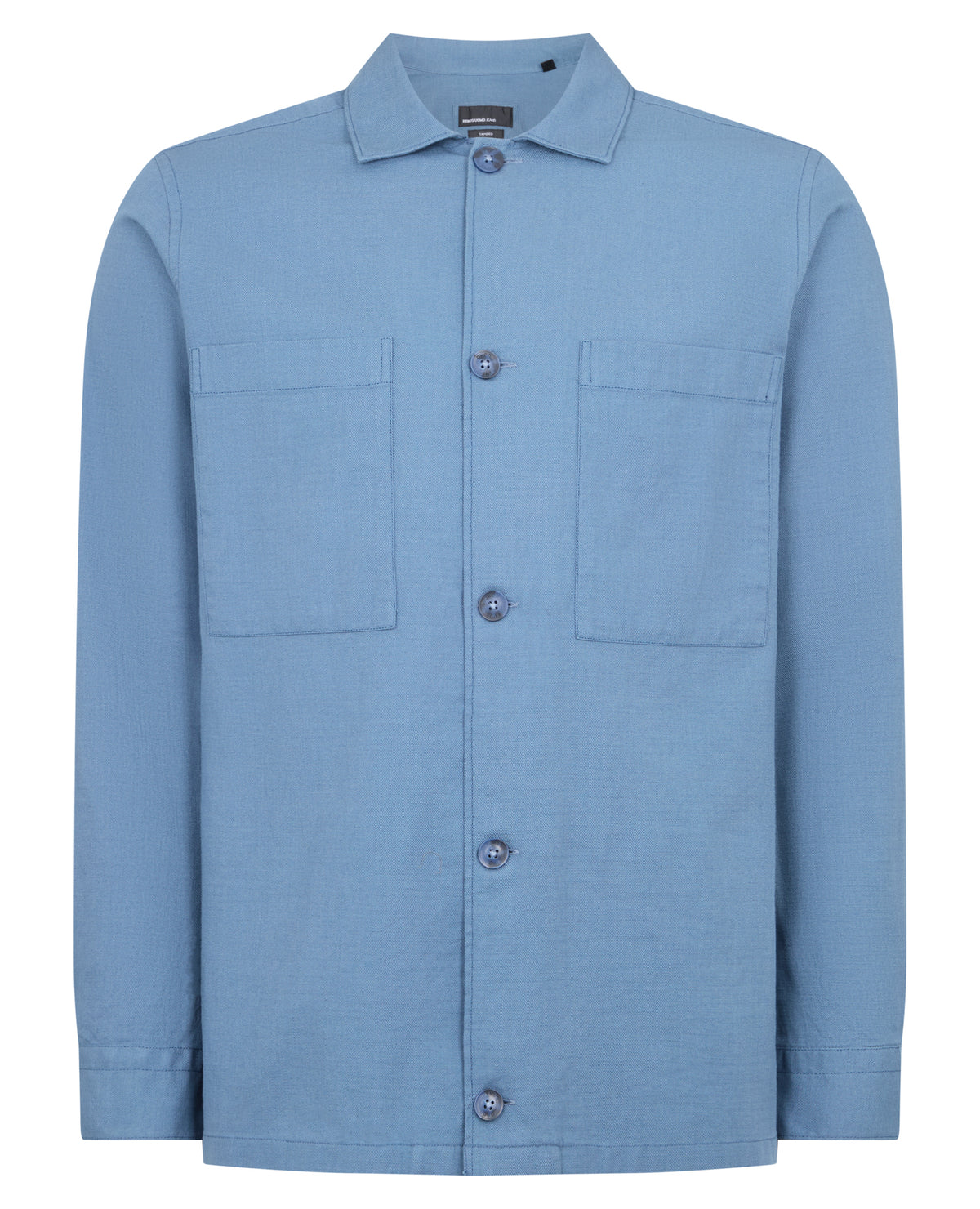 Man wearing a blue casual shirt