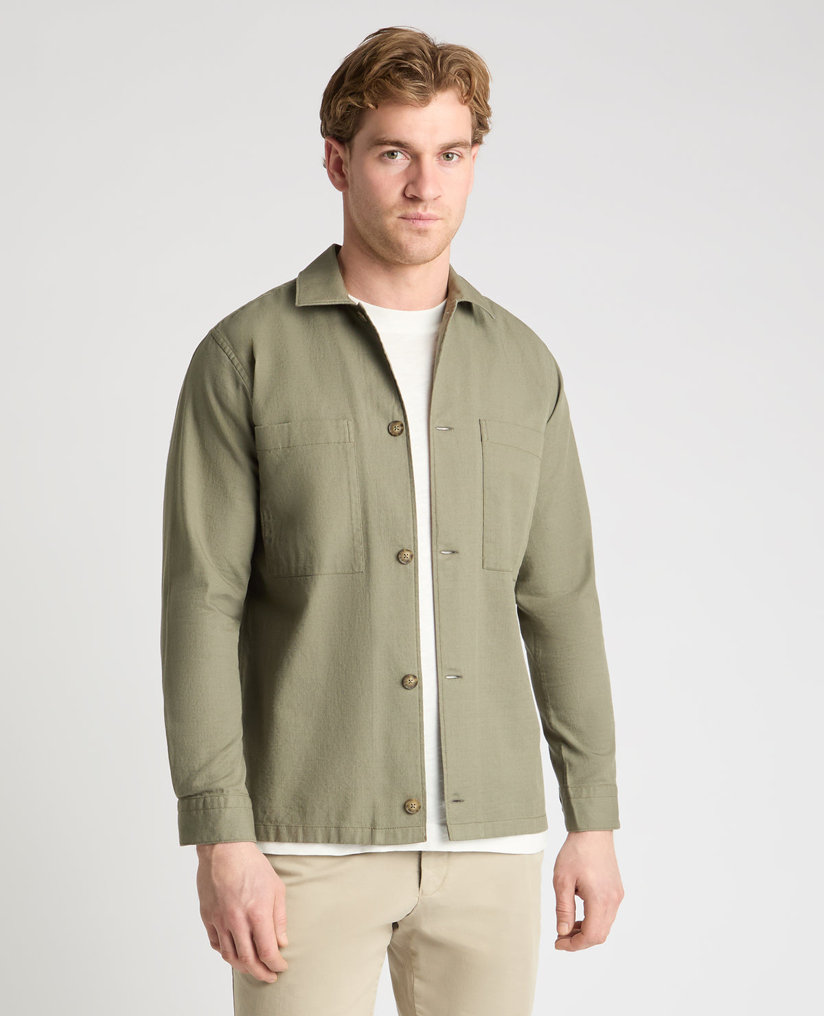Man wearing a green casual shirt