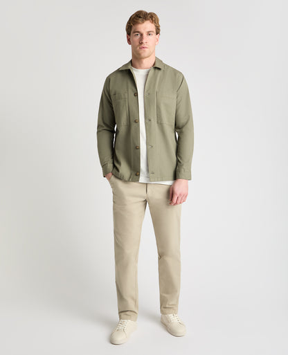 Man wearing a green casual shirt