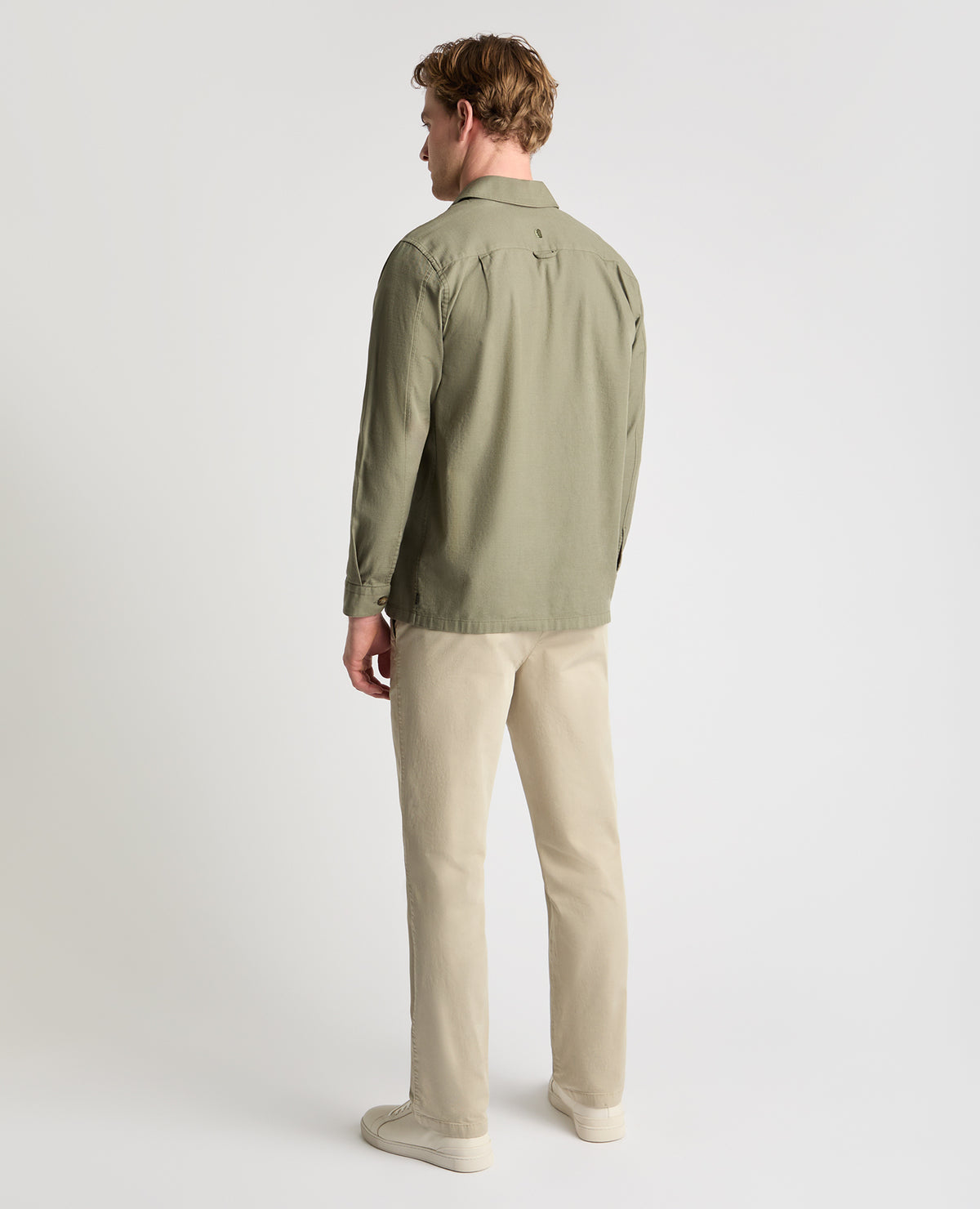 Man wearing a green casual shirt