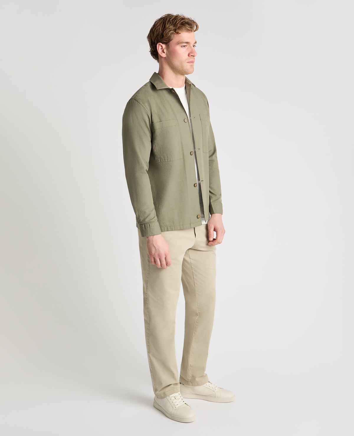 Man wearing a green casual shirt