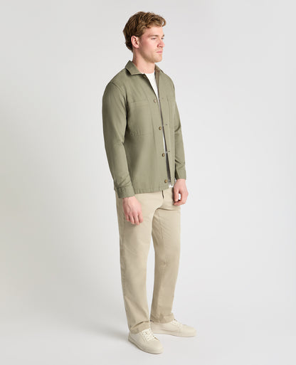 Man wearing a green casual shirt