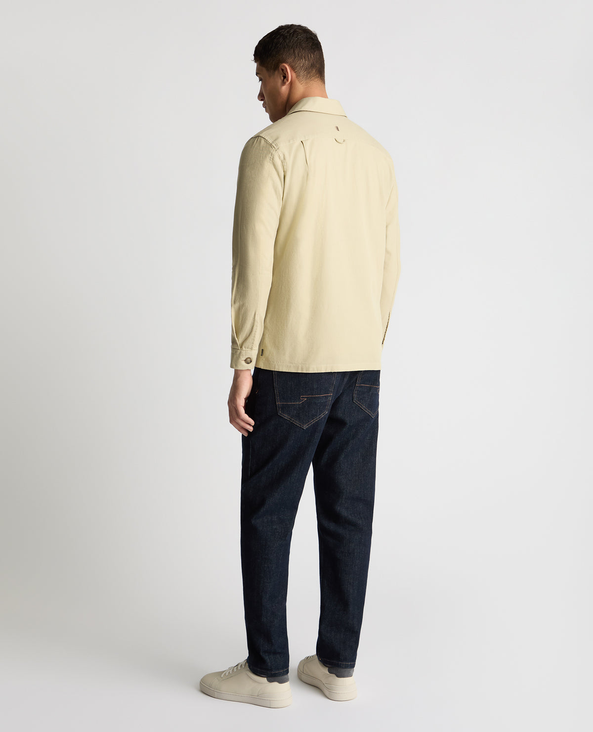 Man wearing a stone casual shirt