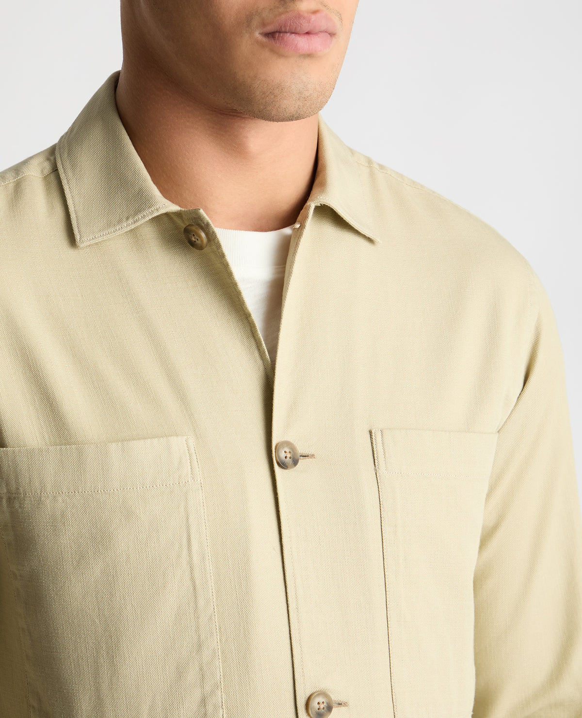 Man wearing a stone casual shirt