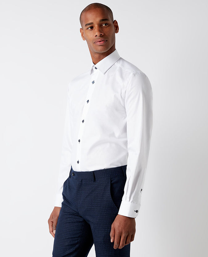 Man wearing a white Tapered Fit Cotton-Blend Satin Shirt