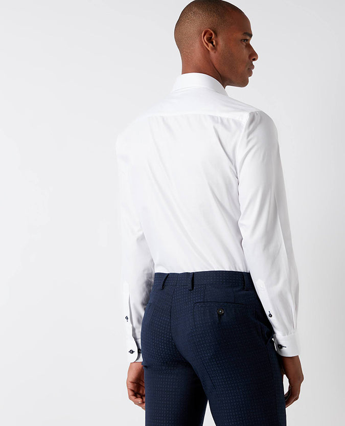 Man wearing a white Tapered Fit Cotton-Blend Satin Shirt