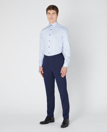 Man wearing a blue Tapered Fit Cotton-Blend Satin Shirt