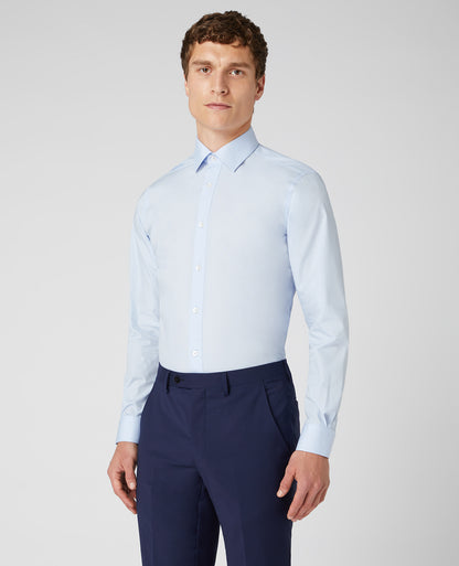 Man wearing a blue Tapered Fit Cotton-Blend Shirt