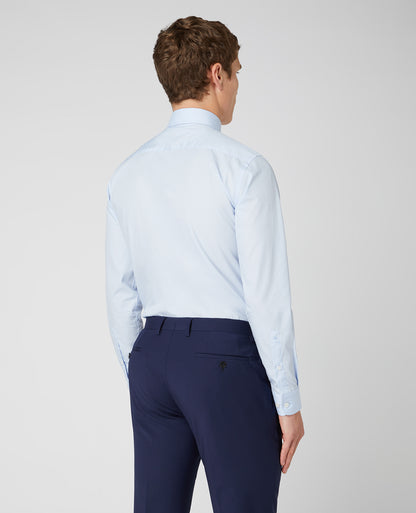 Man wearing a blue Tapered Fit Cotton-Blend Shirt
