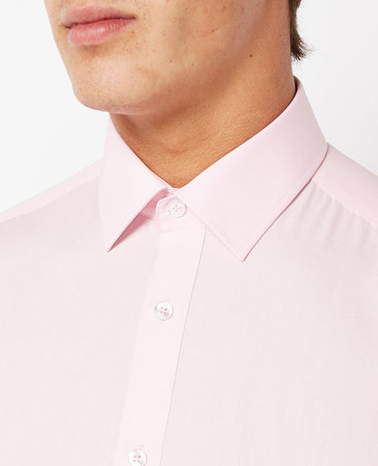 Man wearing a red Tapered Fit Cotton-Blend Shirt