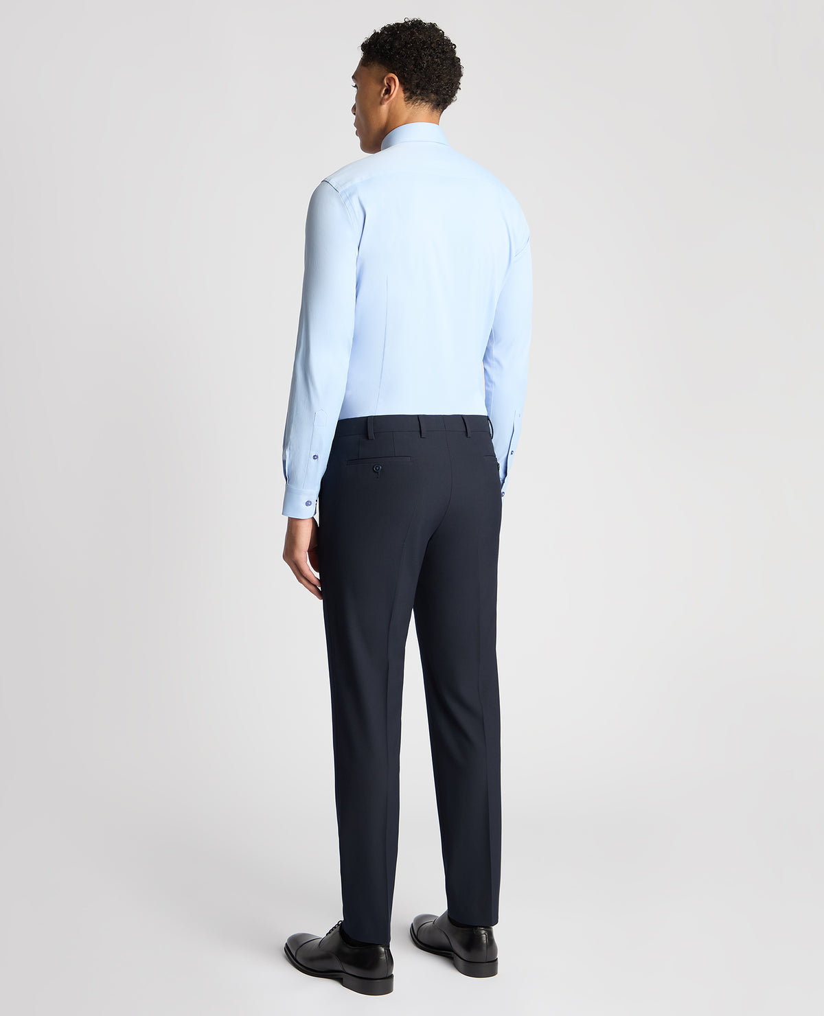 Man wearing a blue Slim Fit Cotton Stretch Shirt
