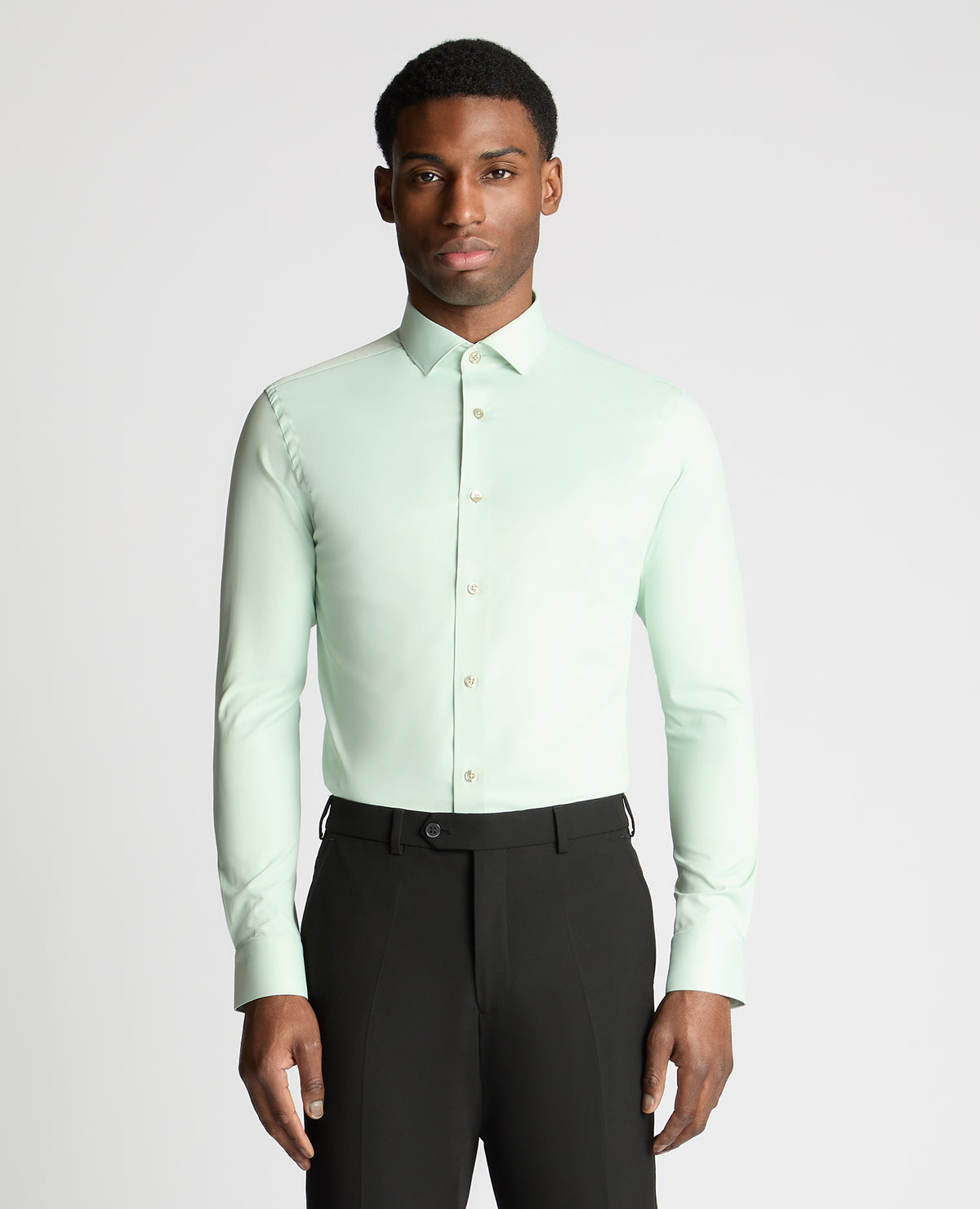Man wearing a green formal shirt