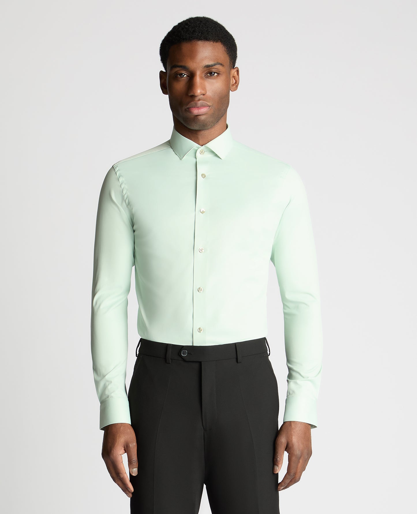 Man wearing a green formal shirt
