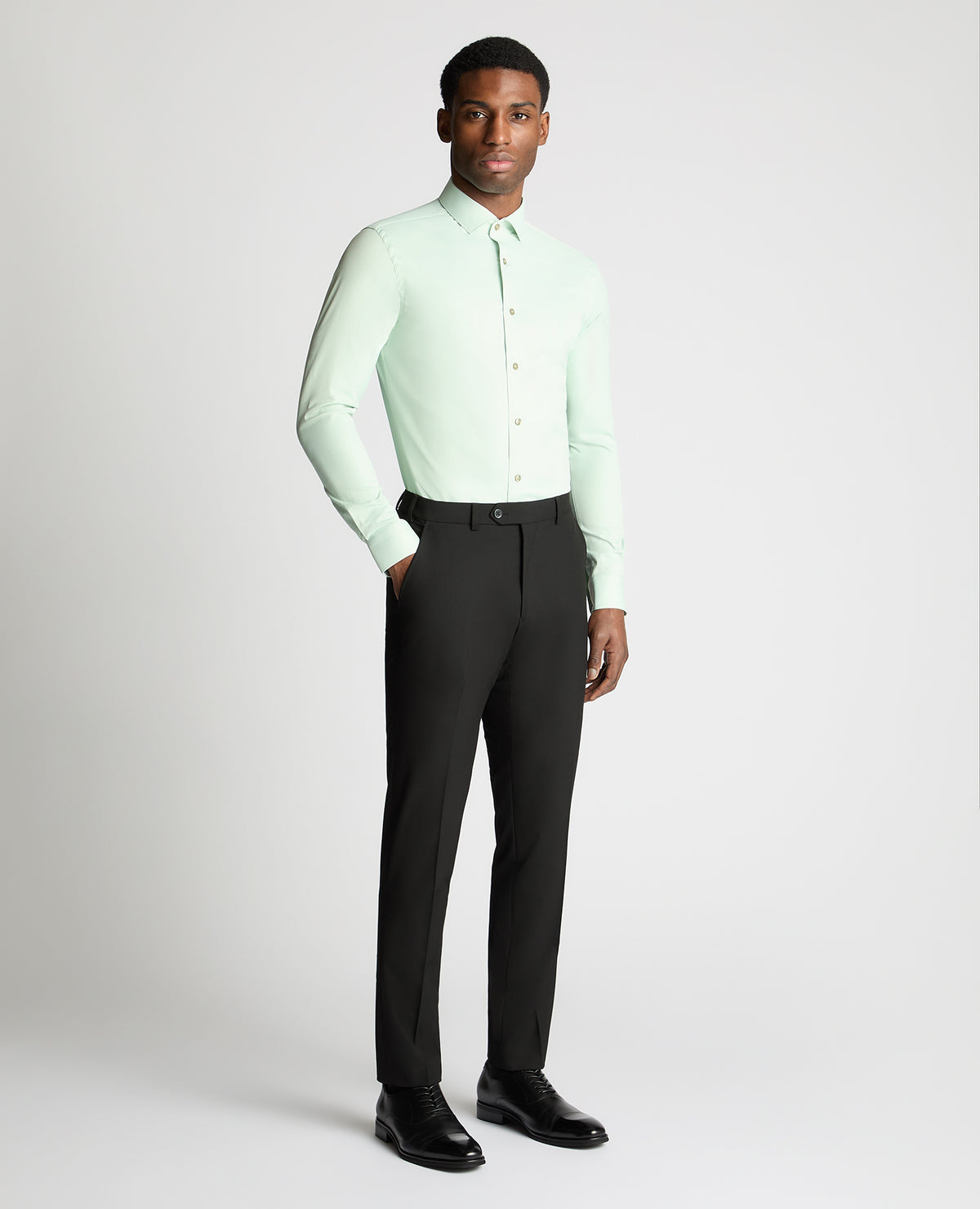 Man wearing a green formal shirt