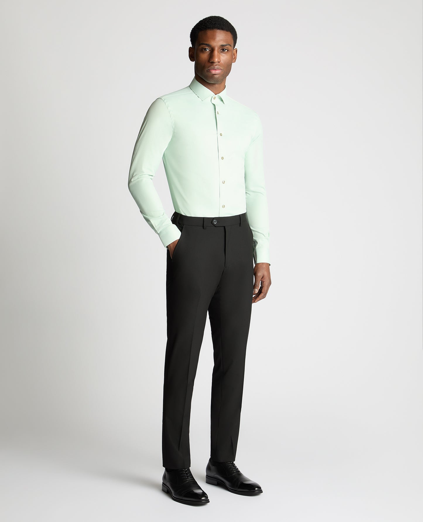 Man wearing a green formal shirt