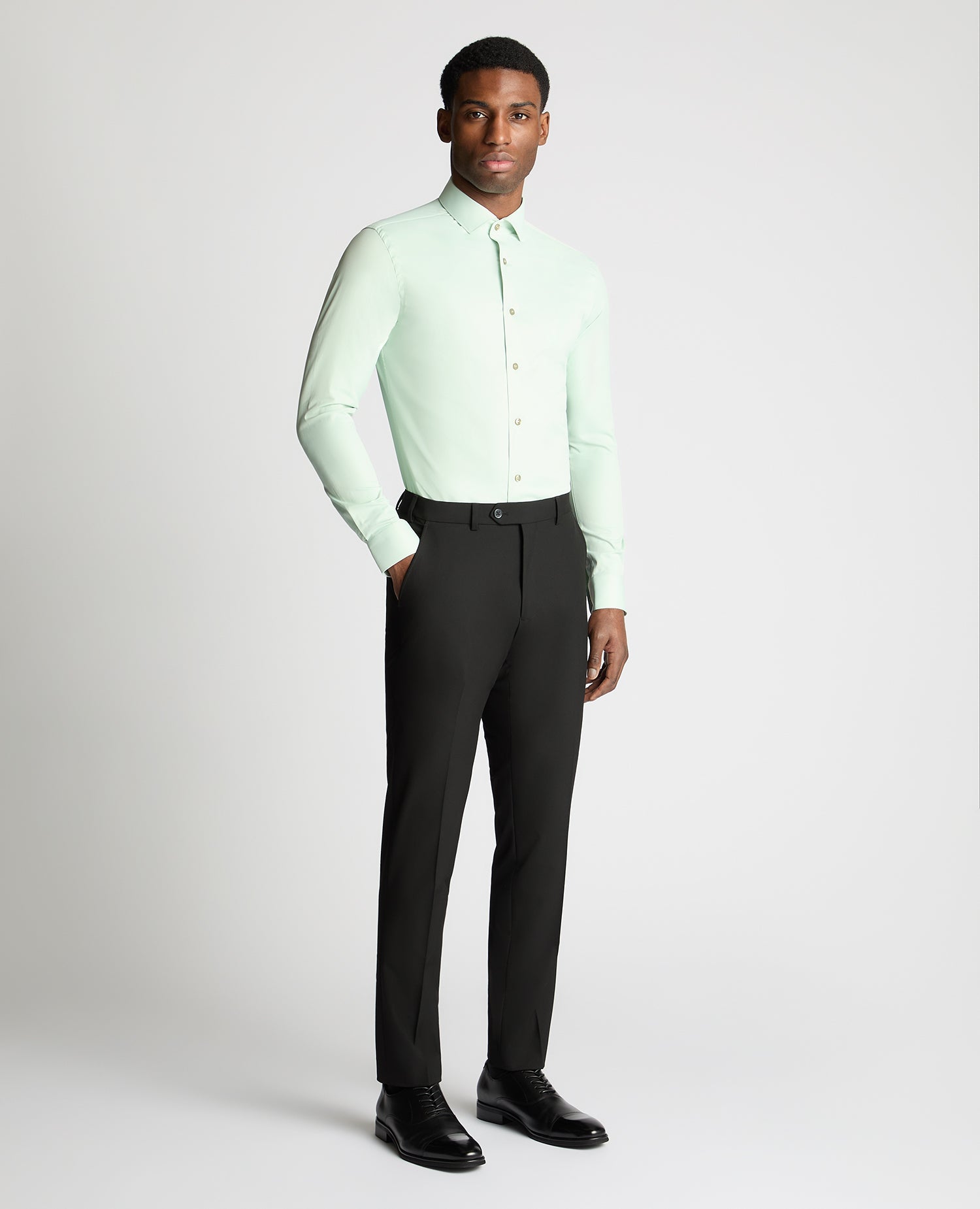 Man wearing a green formal shirt