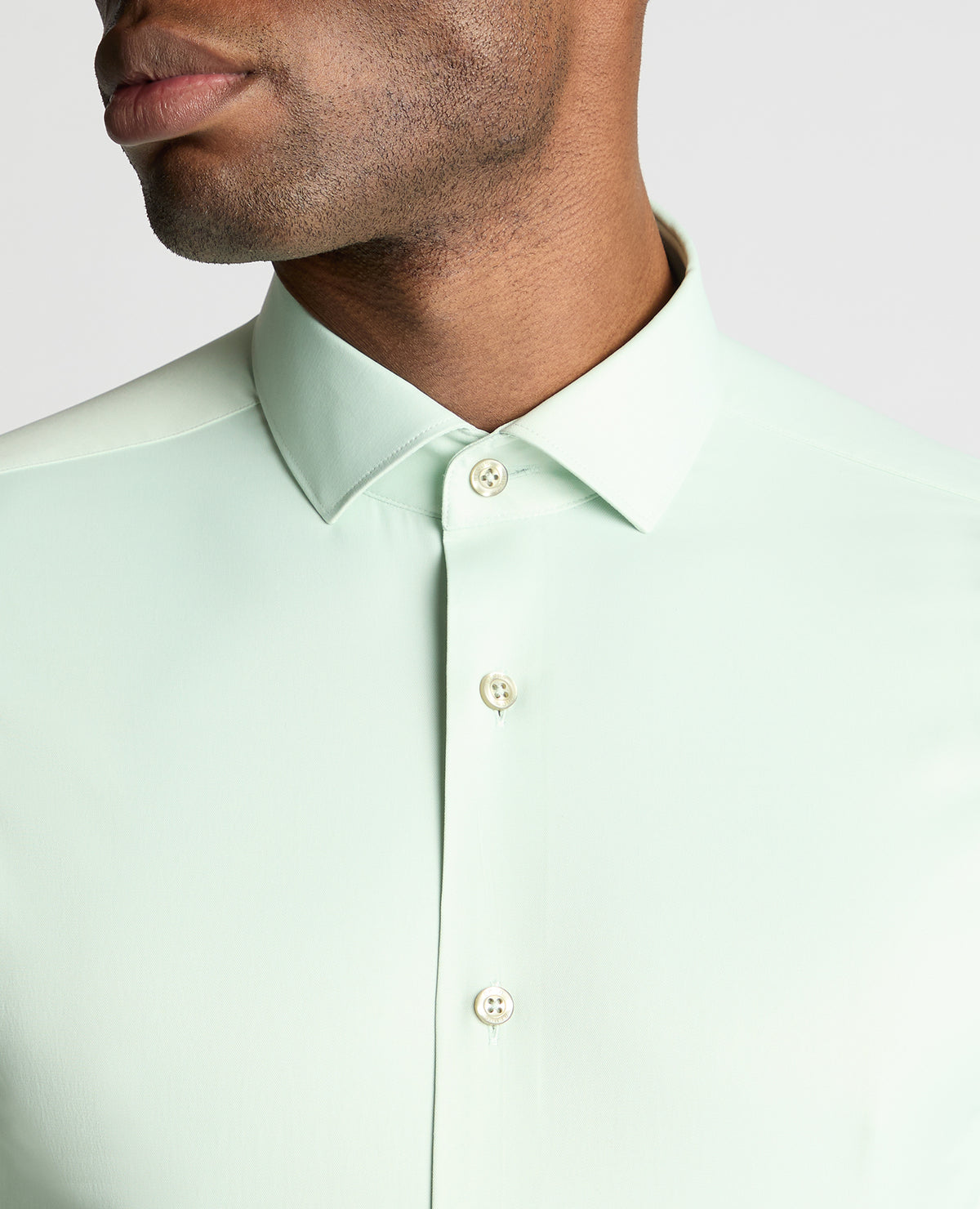 Man wearing a green formal shirt