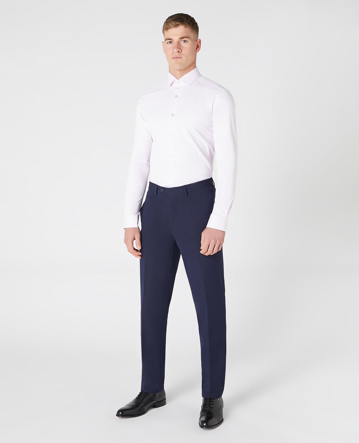 Man wearing a pink Slim Fit Cotton Stretch Shirt
