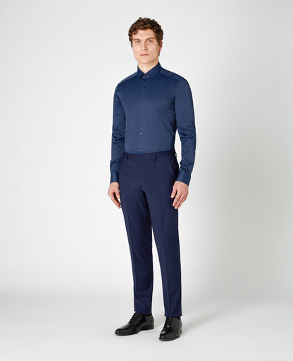 Man wearing a navy Slim Fit Cotton Stretch Shirt