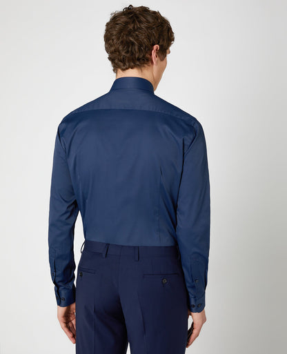 Man wearing a navy Slim Fit Cotton Stretch Shirt