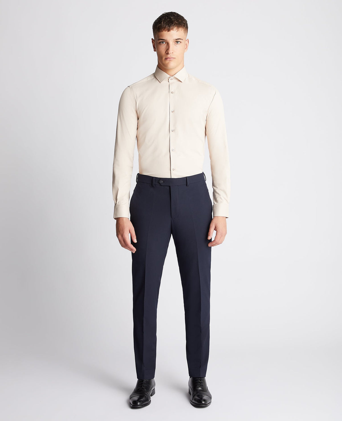 Man wearing a sand Slim Fit Cotton Stretch Shirt