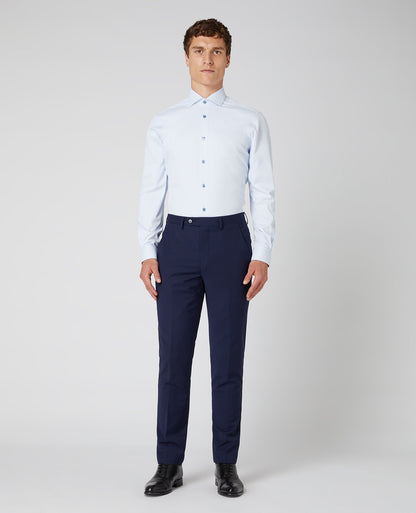 Man wearing a blue Tapered Fit Cotton Stretch Shirt