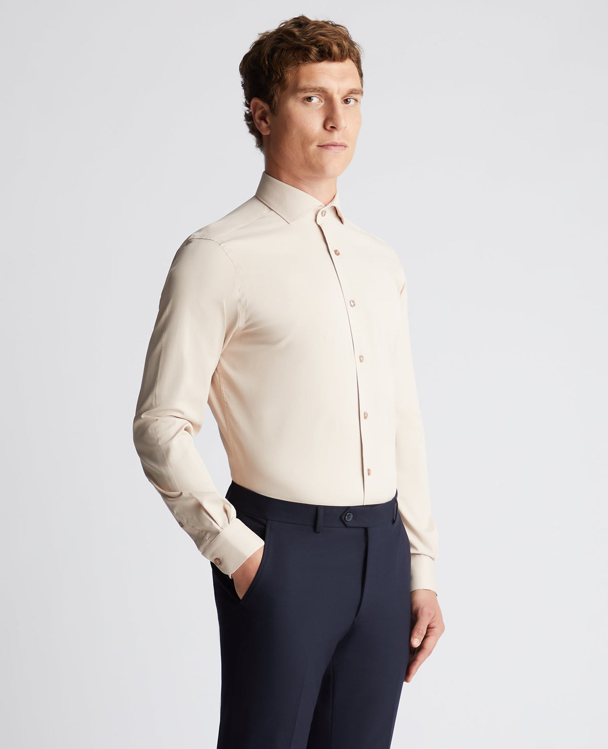 Man wearing a sand Tapered Fit Cotton Stretch Shirt
