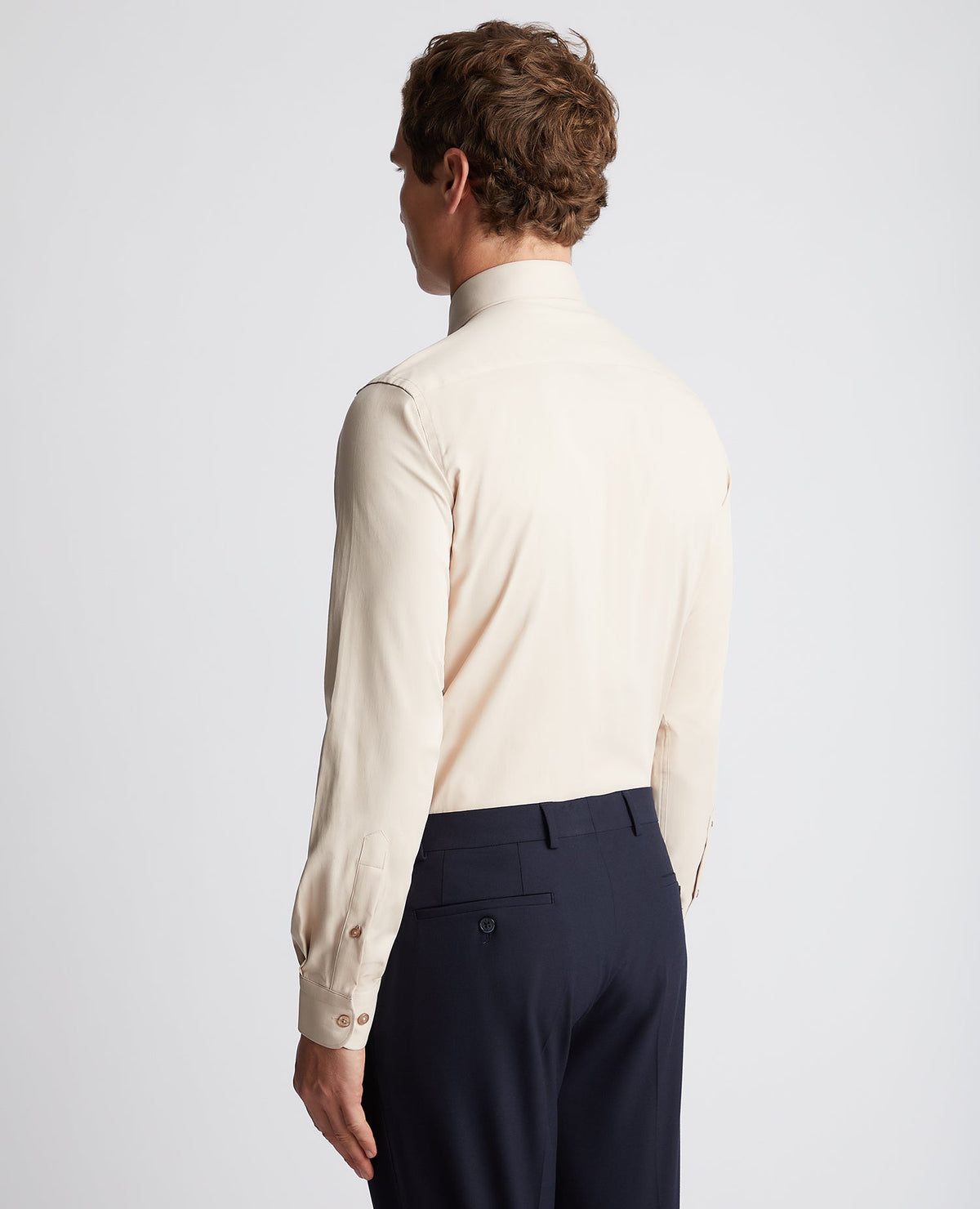 Man wearing a sand Tapered Fit Cotton Stretch Shirt