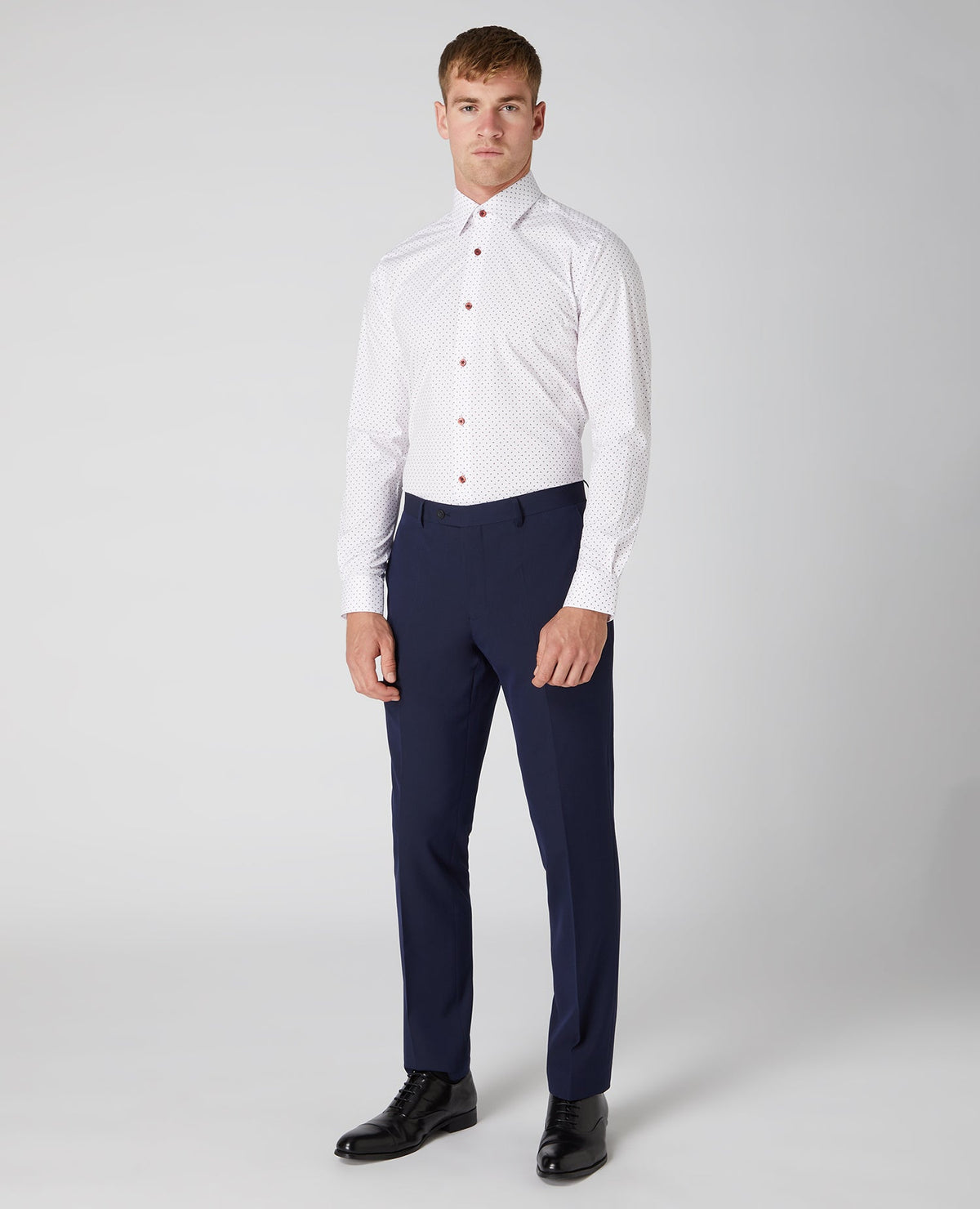 Man wearing a pink Tapered Fit Print Cotton-Blend Stretch Shirt