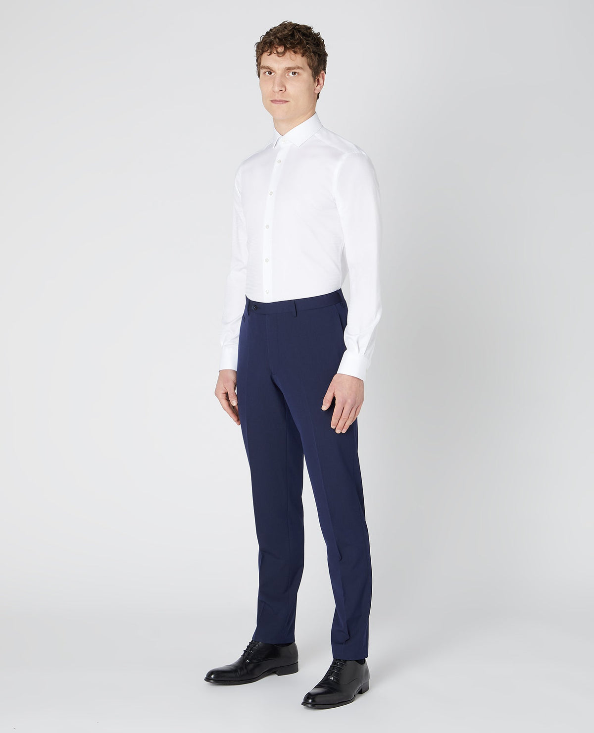 Man wearing a white Slim Fit Cotton Shirt