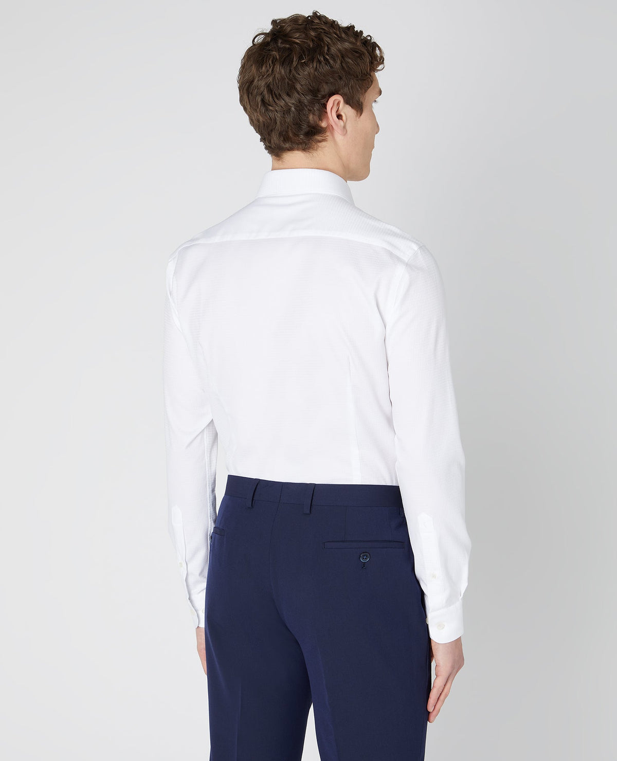 Man wearing a white Slim Fit Cotton Shirt