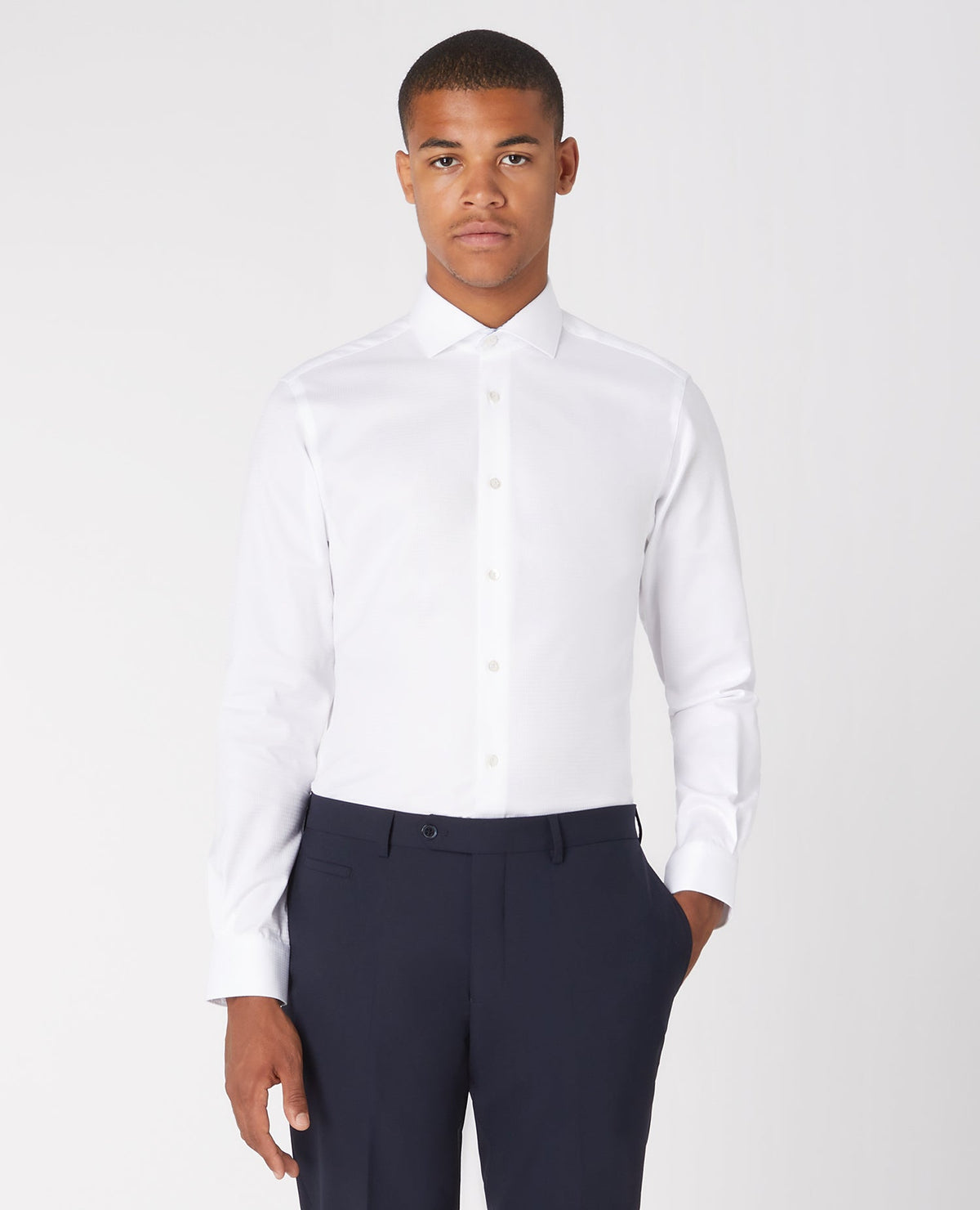 Man wearing a white Tapered Fit Cotton Shirt