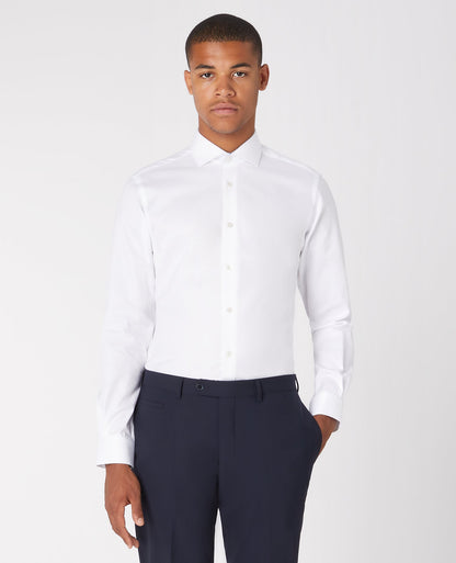 Man wearing a white Tapered Fit Cotton Shirt