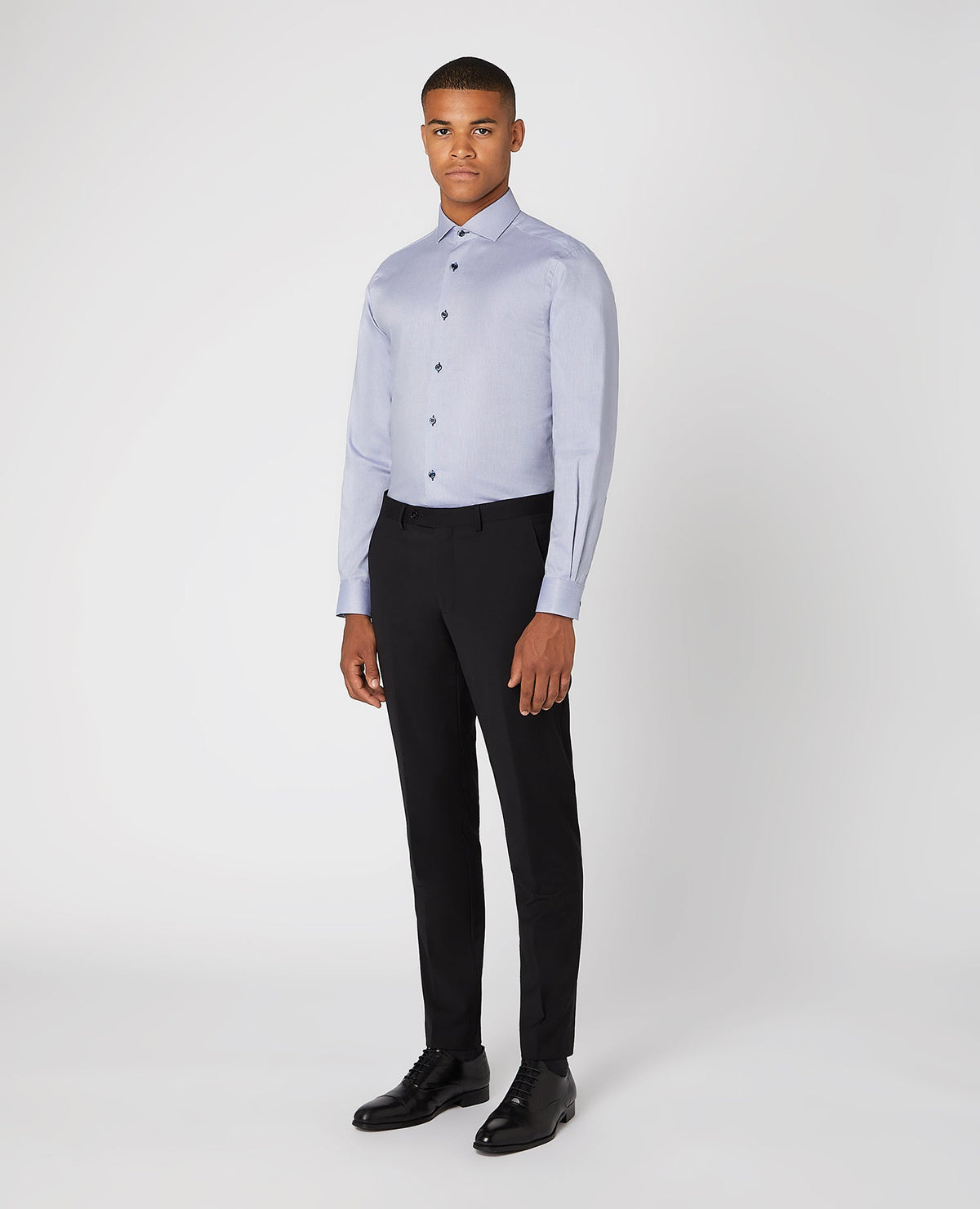 Man wearing a blue Tapered Fit Cotton Shirt