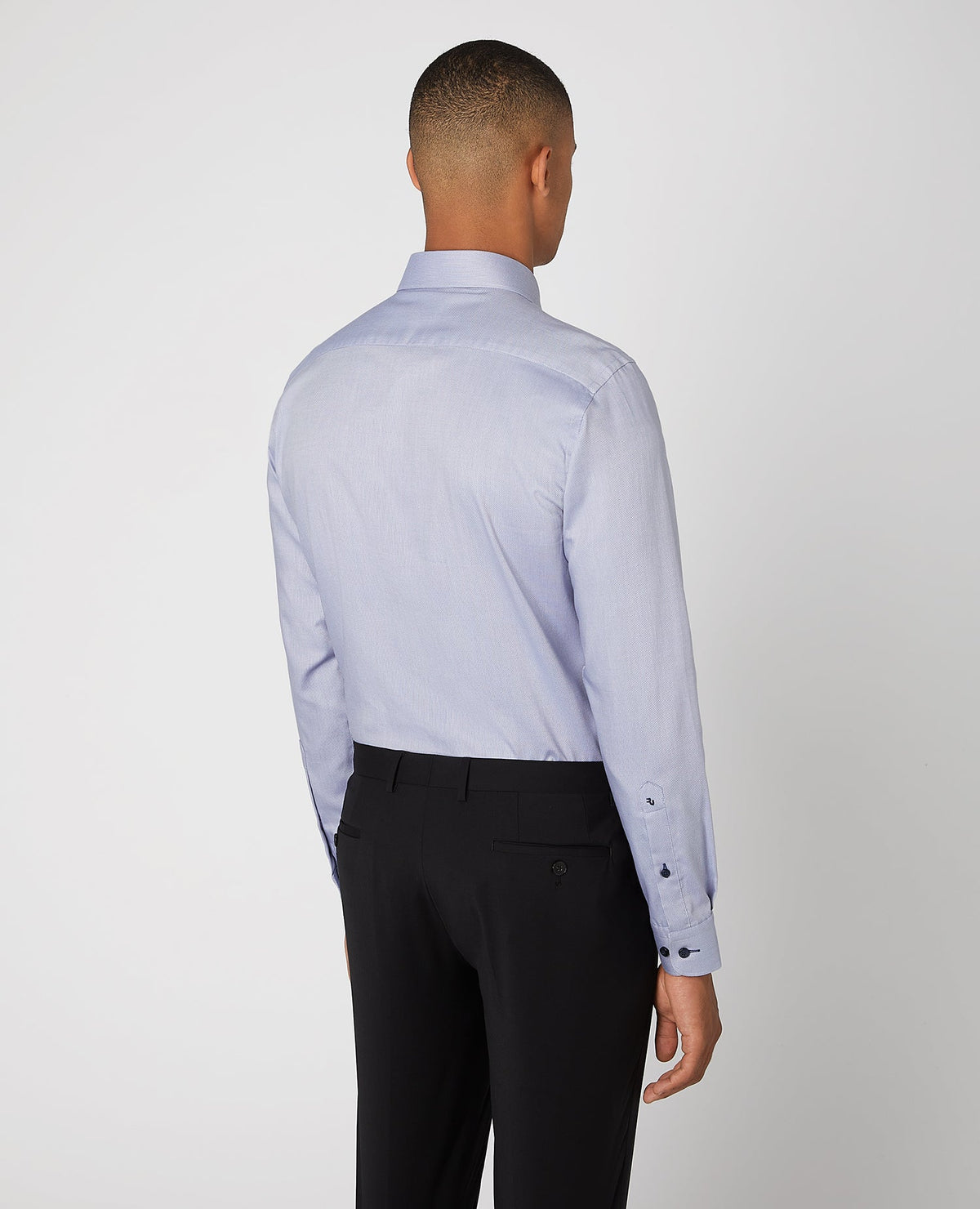 Man wearing a blue Tapered Fit Cotton Shirt
