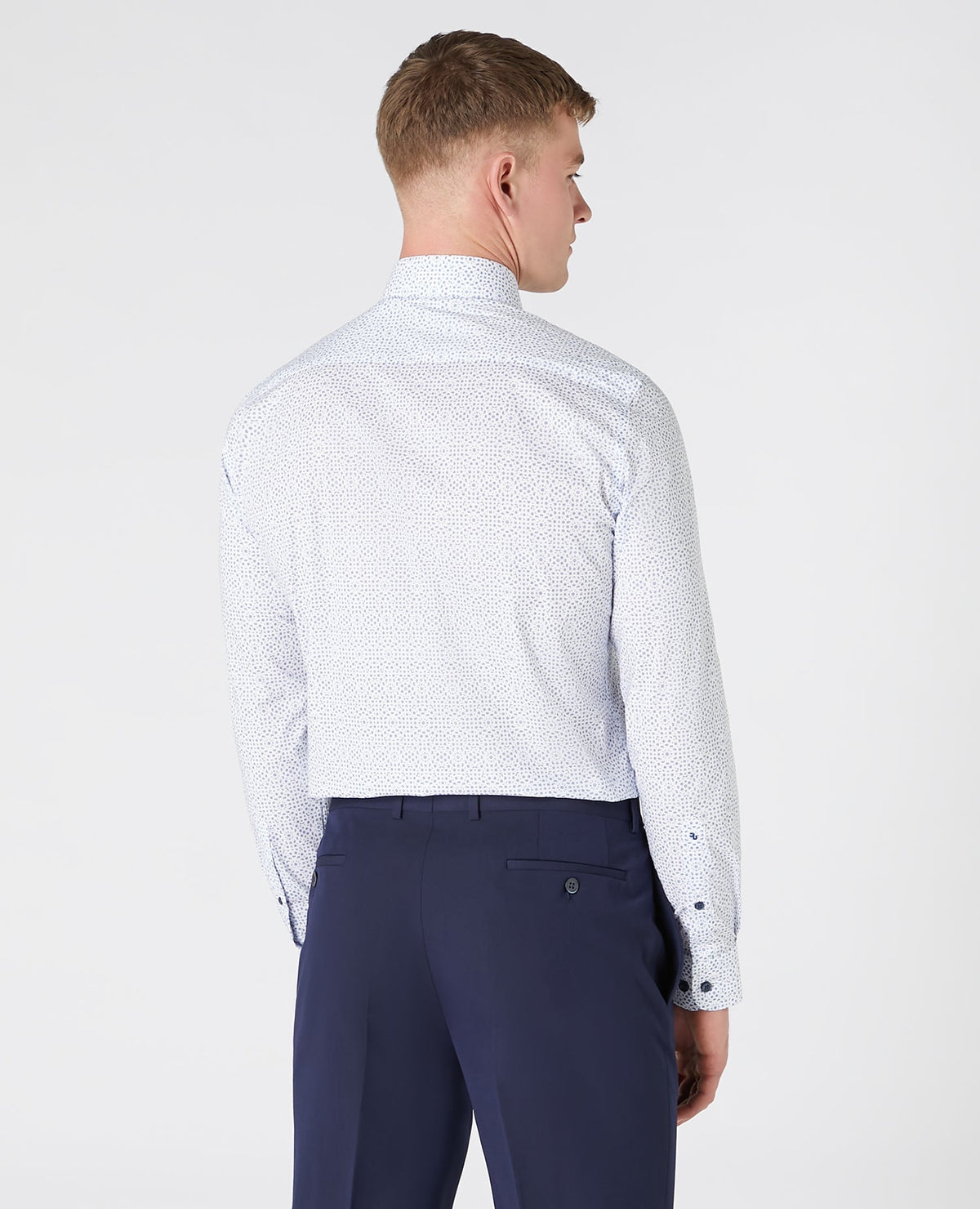 Man wearing a navy Tapered Fit Print Cotton Shirt