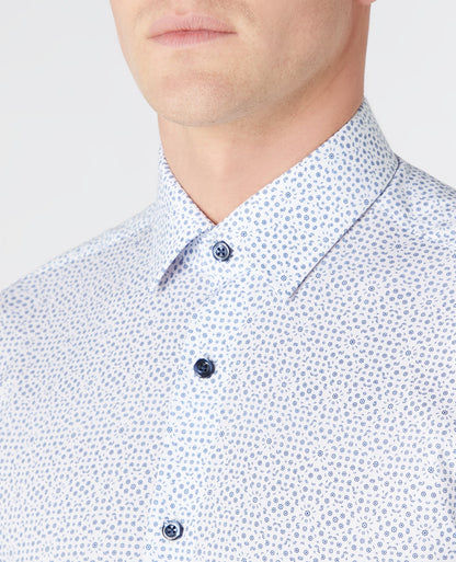 Man wearing a navy Tapered Fit Print Cotton Shirt