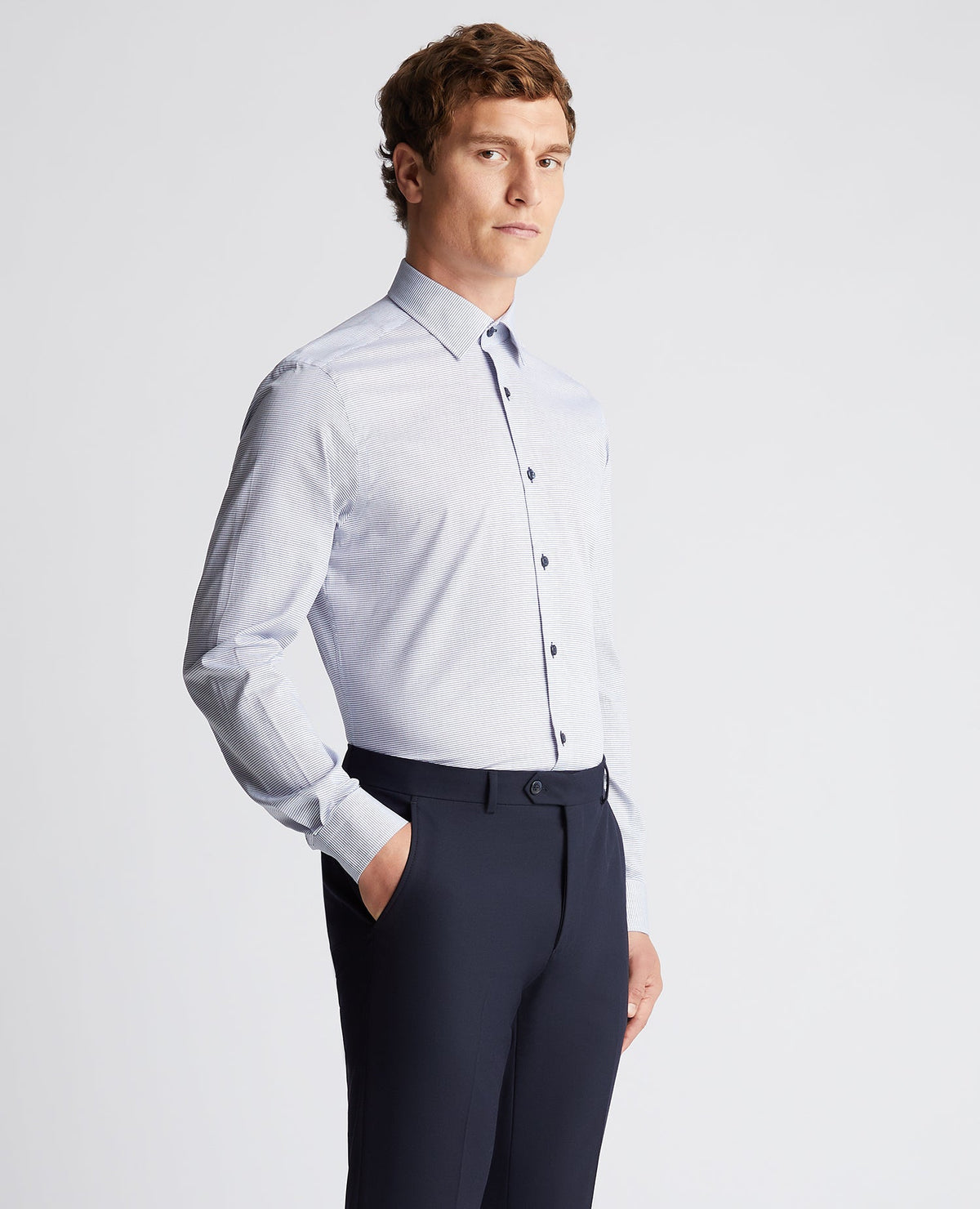 Man wearing a blue Tapered Fit Cotton Woven Shirt