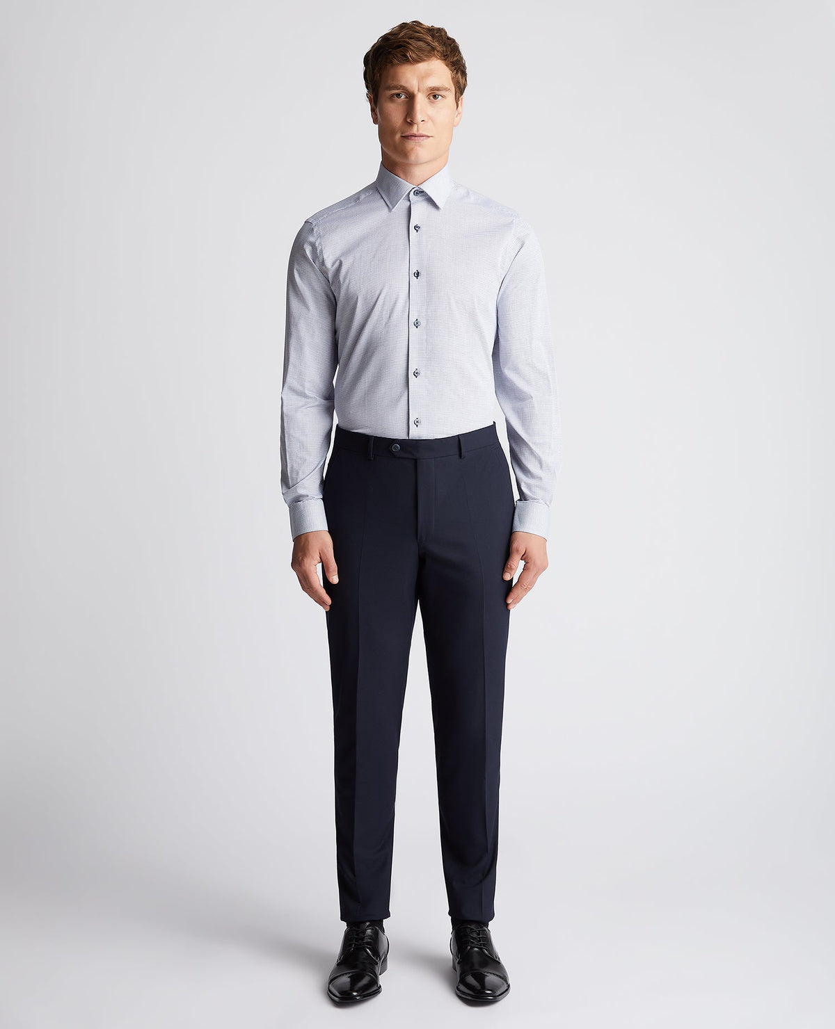 Man wearing a blue Tapered Fit Cotton Woven Shirt