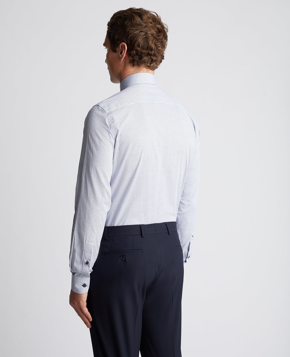 Man wearing a blue Tapered Fit Cotton Woven Shirt