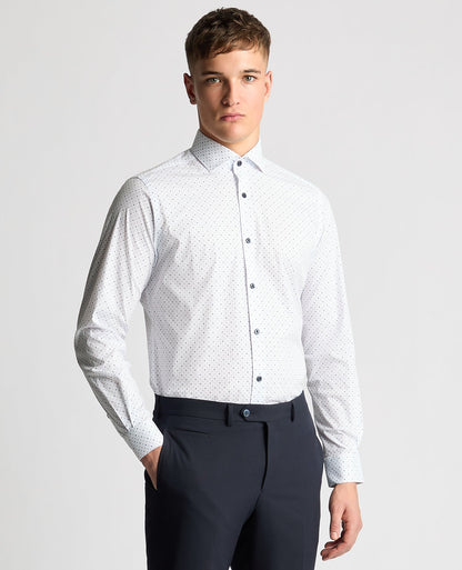 Man wearing a navy Tapered Fit Print Cotton Stretch Shirt