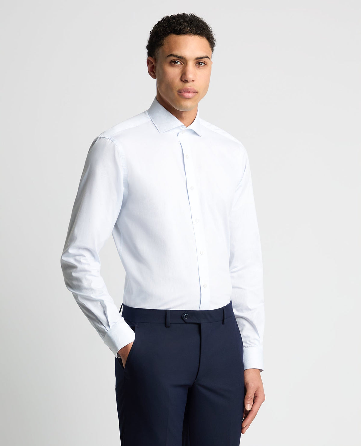 Man wearing a blue Tapered Fit Pinstripe Cotton Shirt