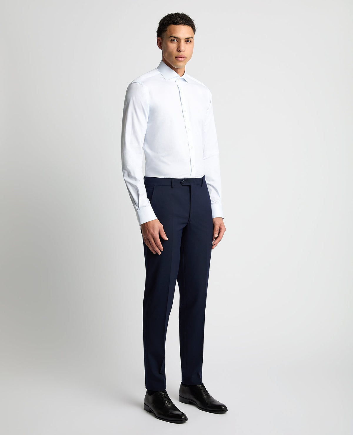 Man wearing a blue Tapered Fit Pinstripe Cotton Shirt