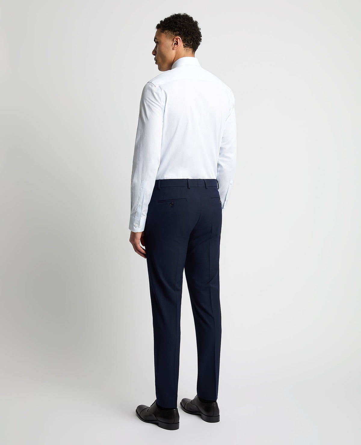 Man wearing a blue Tapered Fit Pinstripe Cotton Shirt