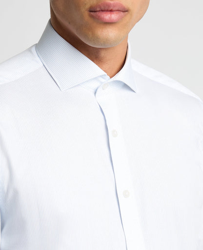 Man wearing a blue Tapered Fit Pinstripe Cotton Shirt