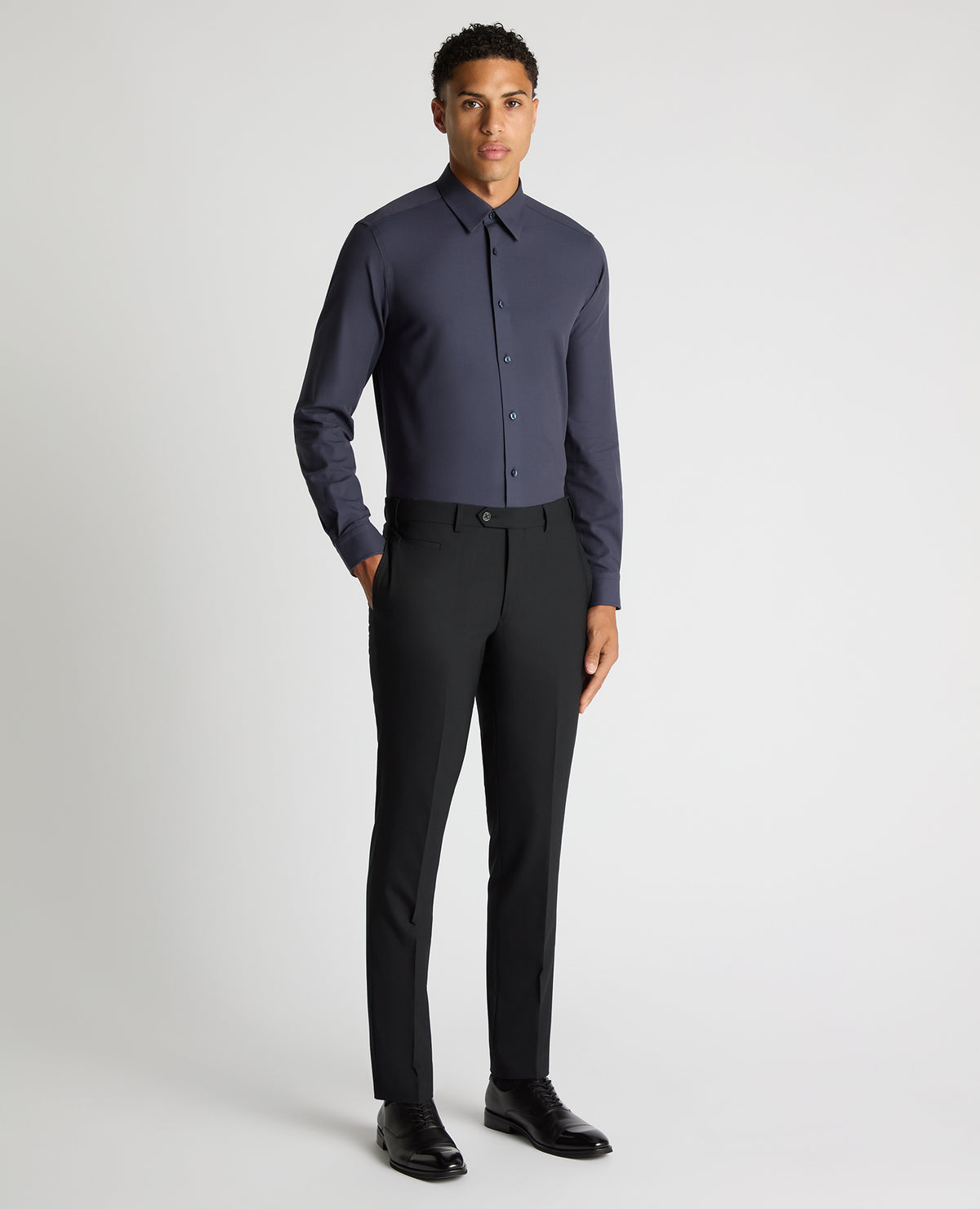 Man wearing a navy Regular Fit Fine Twill Comfort Shirt