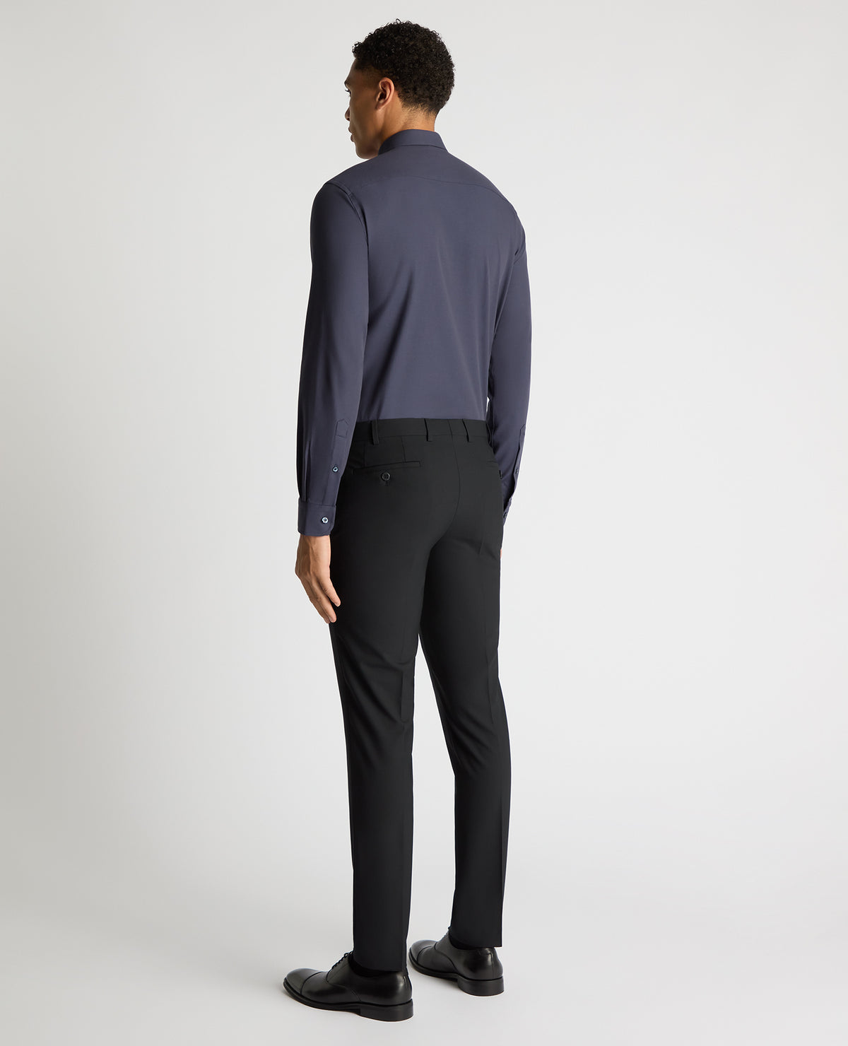 Man wearing a navy Regular Fit Fine Twill Comfort Shirt
