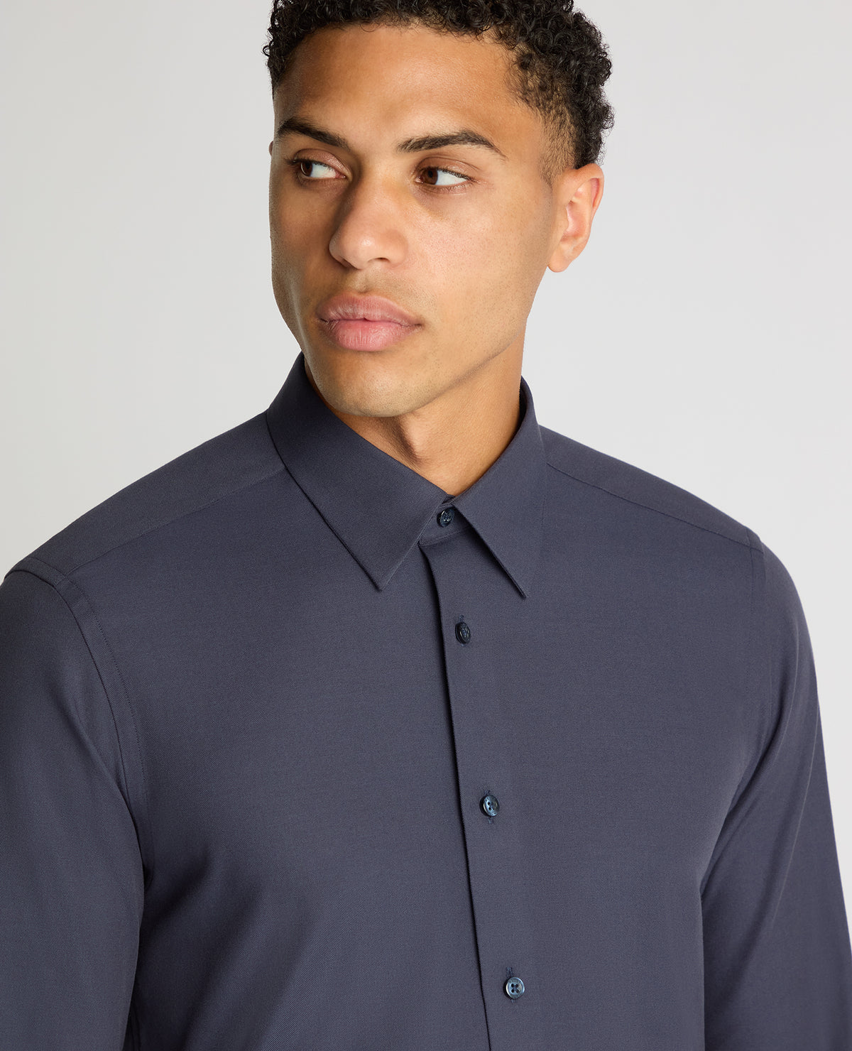 Man wearing a navy Regular Fit Fine Twill Comfort Shirt