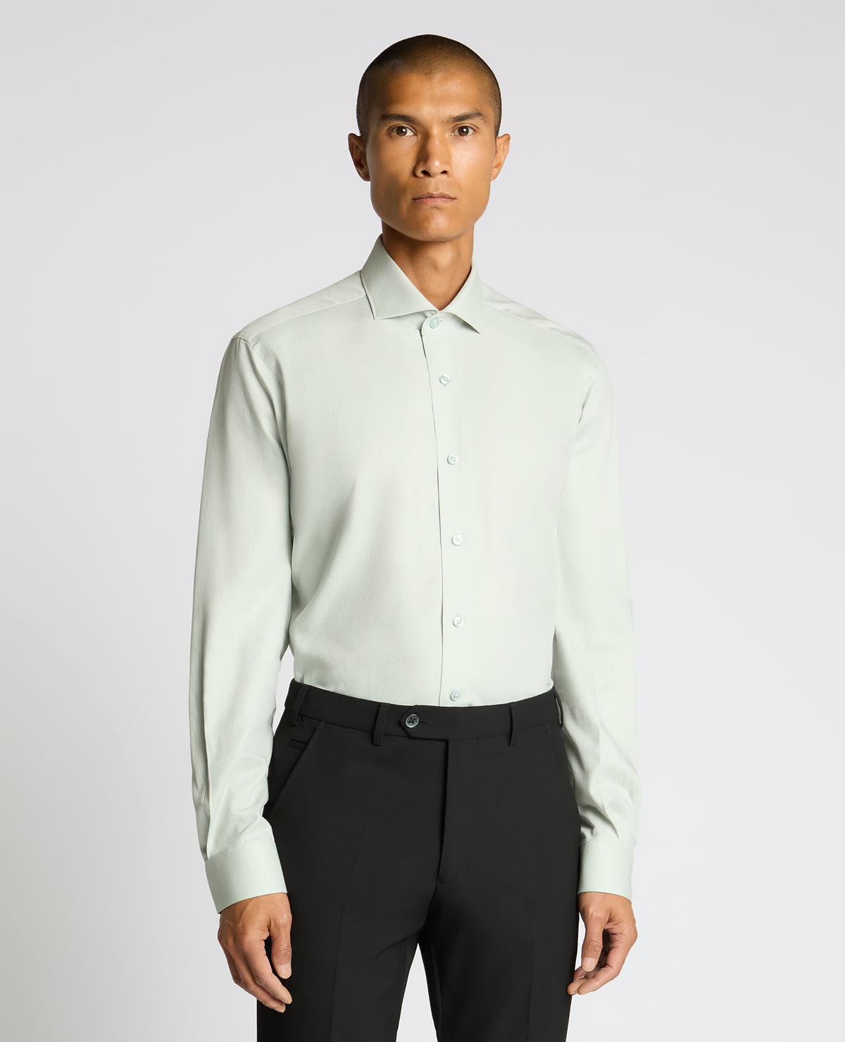 Man wearing a green Tapered Fit Cotton Shirt