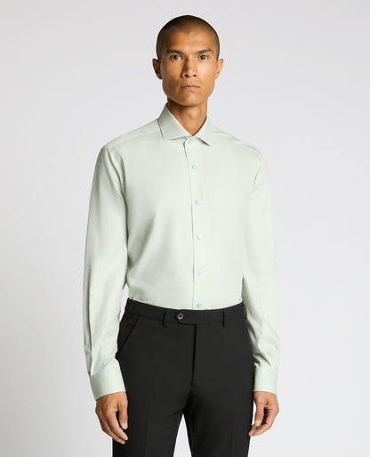 Man wearing a green Tapered Fit Cotton Shirt